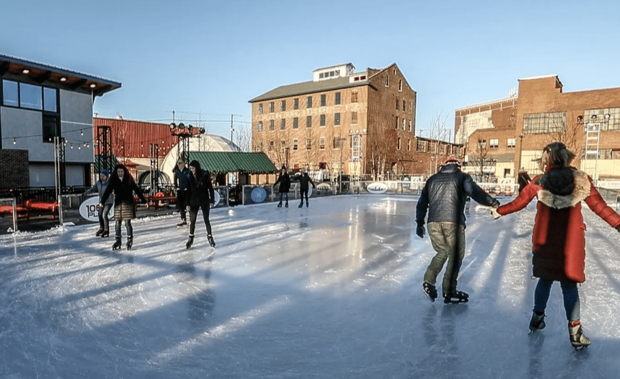 People ice skating in winter as they learn about snowbird travel tips 